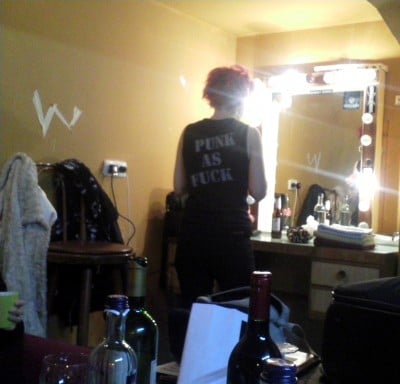 Beki getting ready before the show. What the shirt says is true.